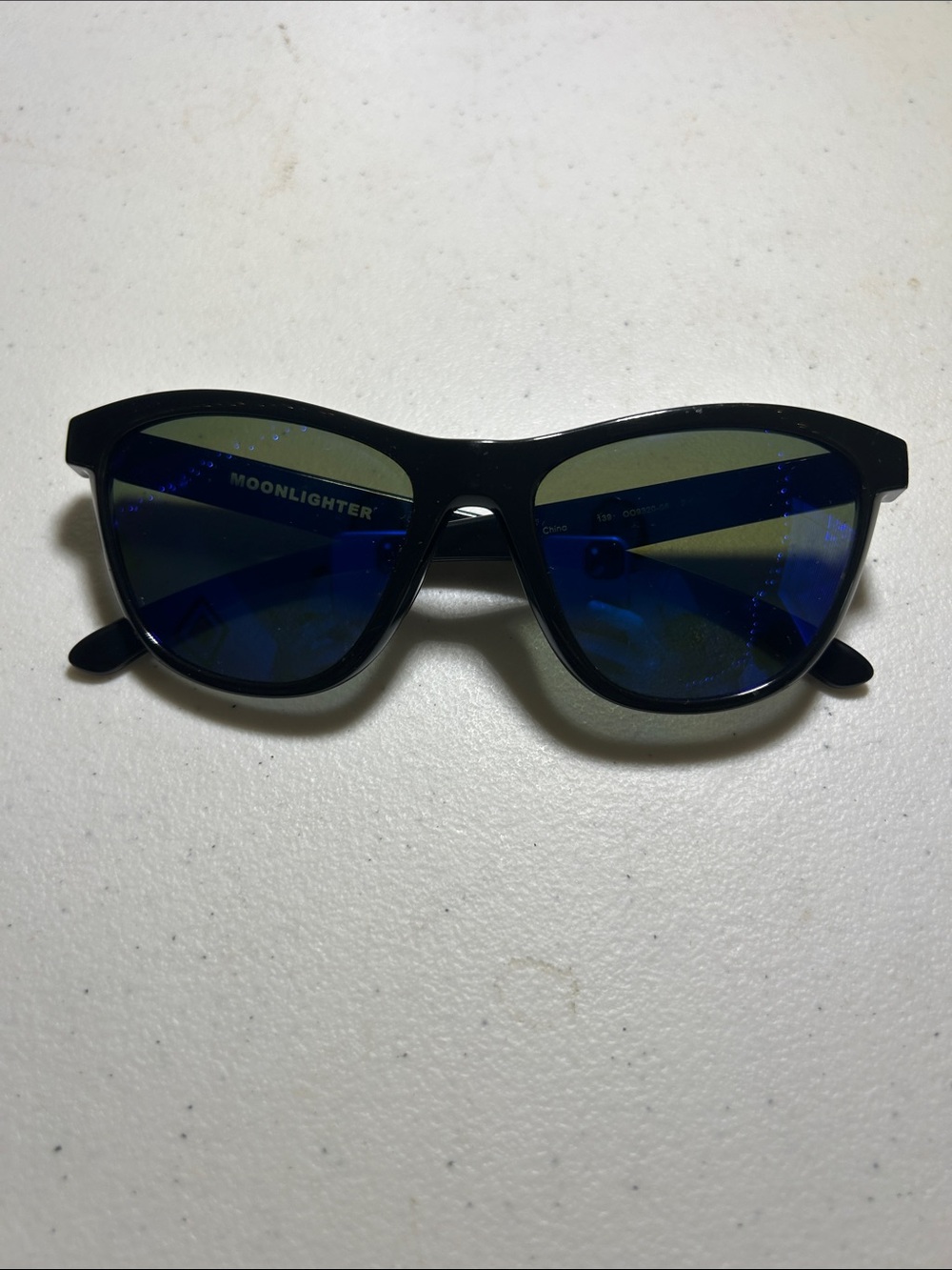 Oakley Black Frame Blue Lens Sunglasses